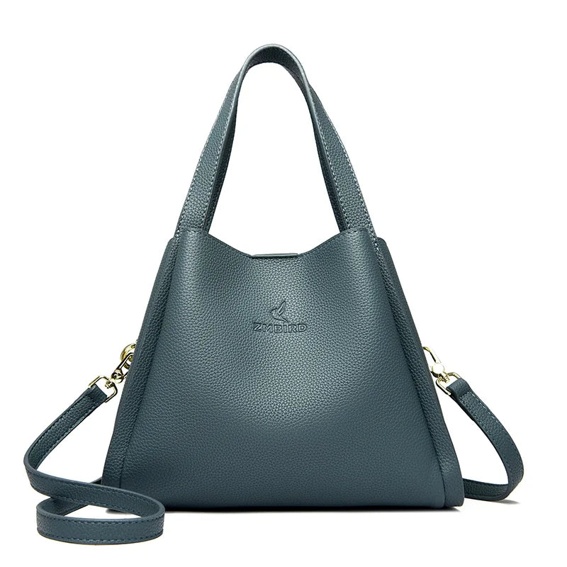 **VANDERWAH Genuine Leather Handbag** – A stylish and versatile **top-handle bag** crafted from **soft leather**, designed for women who value elegance and functionality. Features a **3-layer design**, making it perfect for