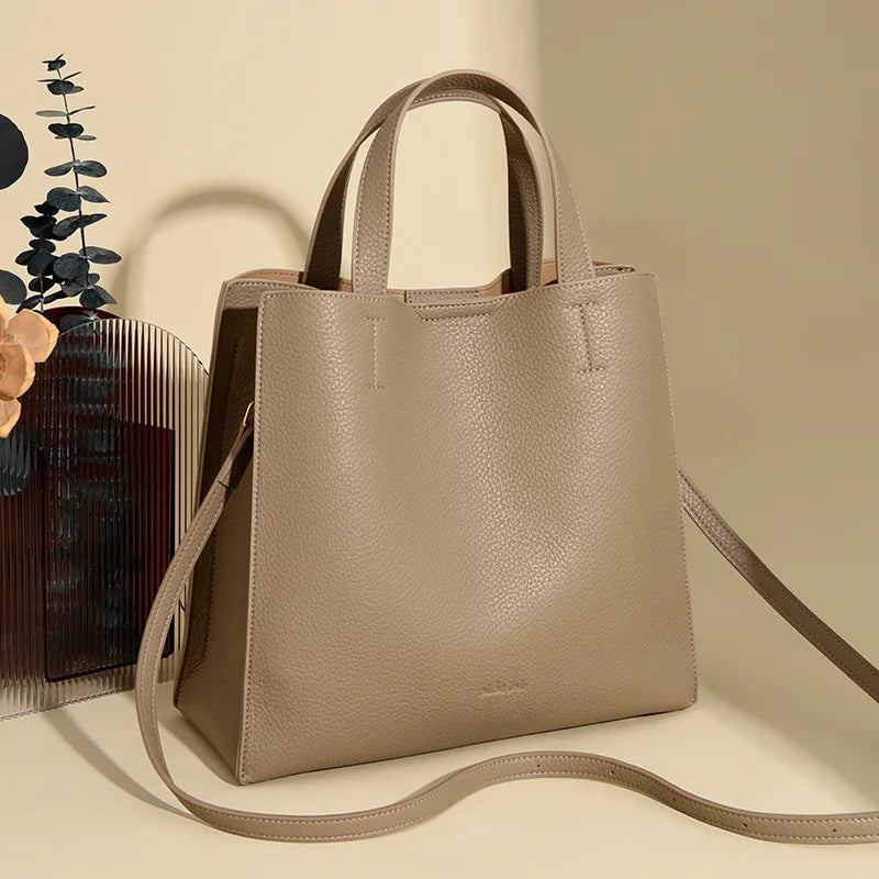 **2024 Elegant Leather Shoulder Bag** – A **fashionable and spacious handbag** designed for modern women. Featuring a **large capacity**, **simple solid design**, and a **commuter-friendly style**, it's perfect for everyday