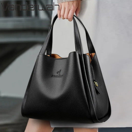 **VANDERWAH Genuine Leather Handbag** – A stylish and versatile **top-handle bag** crafted from **soft leather**, designed for women who value elegance and functionality. Features a **3-layer design**, making it perfect for