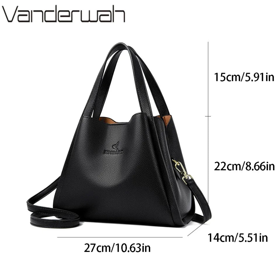 **VANDERWAH Genuine Leather Handbag** – A stylish and versatile **top-handle bag** crafted from **soft leather**, designed for women who value elegance and functionality. Features a **3-layer design**, making it perfect for