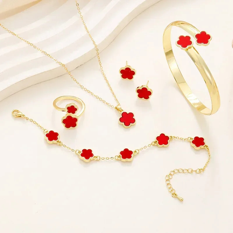 **5-Piece Luxury Jewelry Set** – A stunning set featuring **plum blossom plant design** with **five-leaf flowers**. Includes **earrings, rings, bracelet, necklace, and bangles**. Perfect as a gift for women who love elegant