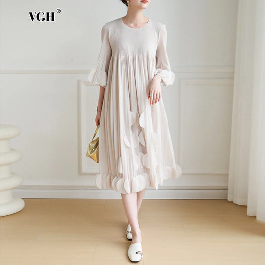 **VGH Elegant Draped Dress** – A sophisticated **round-neck dress** featuring **half sleeves**, a **high waist**, and a **stereoscopic print** for a chic and refined look. The **draped design** adds elegance, making it perf