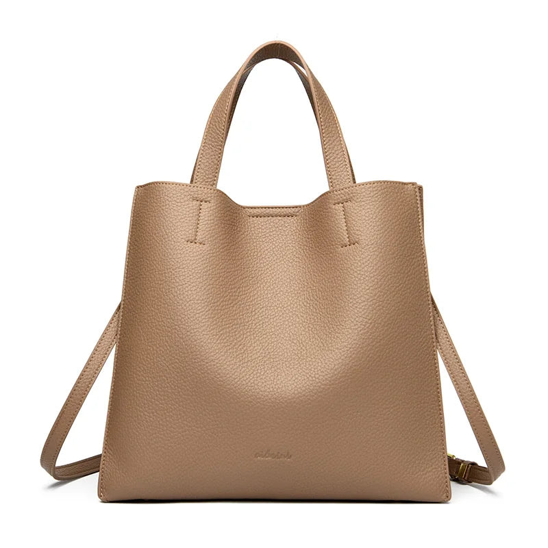 **2024 Elegant Leather Shoulder Bag** – A **fashionable and spacious handbag** designed for modern women. Featuring a **large capacity**, **simple solid design**, and a **commuter-friendly style**, it's perfect for everyday