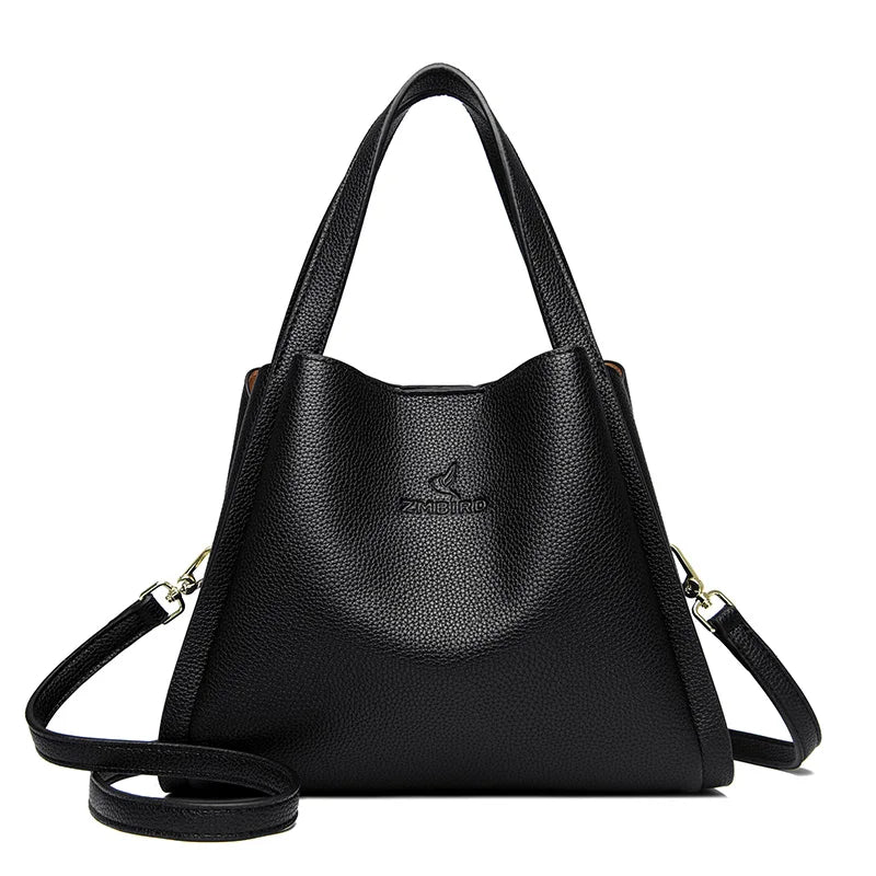 **VANDERWAH Genuine Leather Handbag** – A stylish and versatile **top-handle bag** crafted from **soft leather**, designed for women who value elegance and functionality. Features a **3-layer design**, making it perfect for